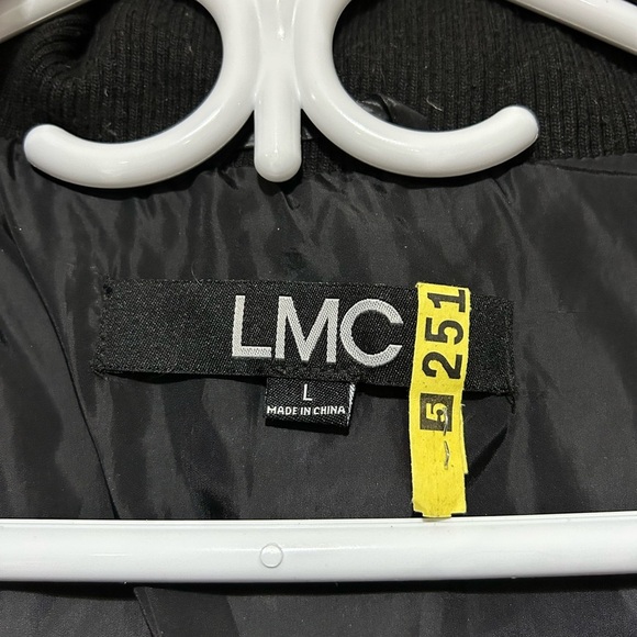 Women's Black Puffer Coat with Faux Fur Trim - Picture 10 of 11